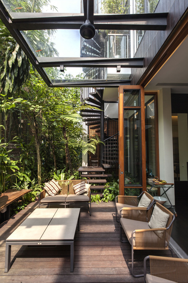 lush-gardens-peekaboo-roof-pool-define-contemporary-home-26-outdoor-lounge.jpg