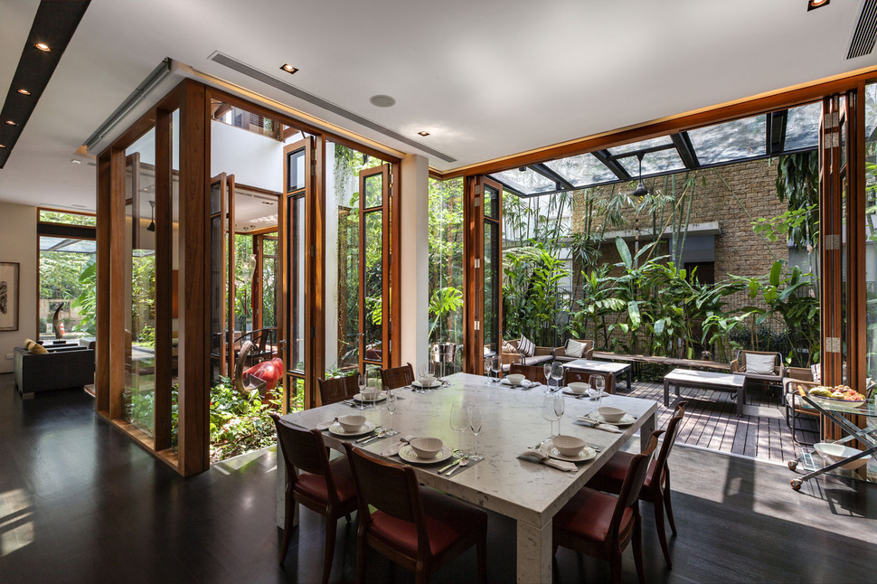 lush-gardens-peekaboo-roof-pool-define-contemporary-home-27-dining.jpg