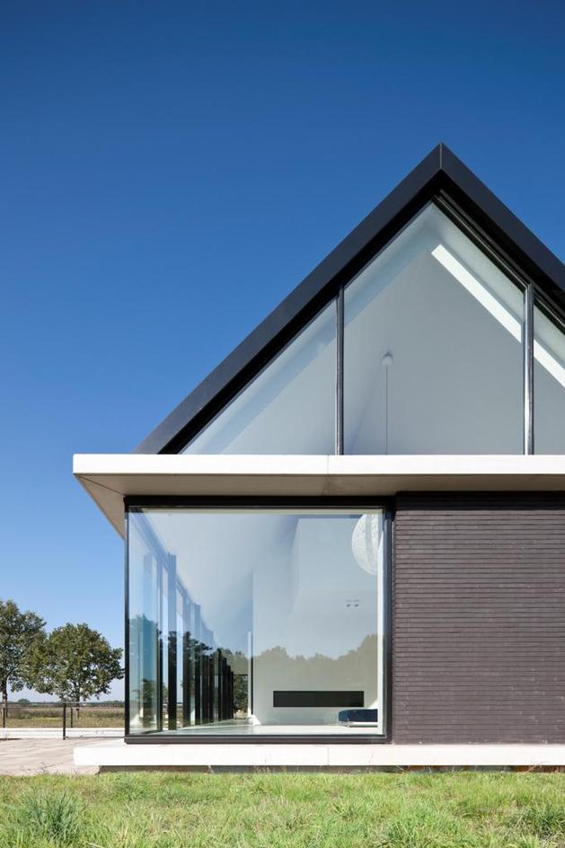 modern-barn-style-home-showcases-glazings-below-grade-ramp-12-exterior.jpg