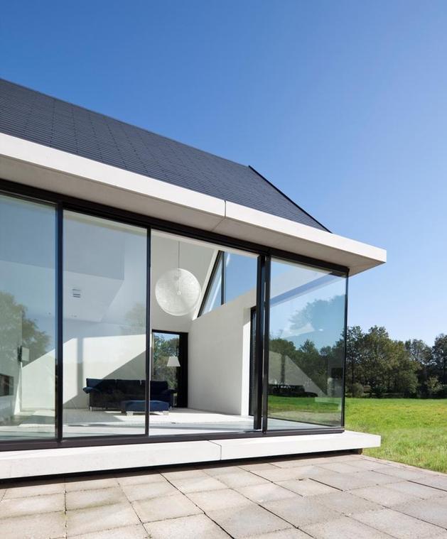 modern-barn-style-home-showcases-glazings-below-grade-ramp-6-social.jpg