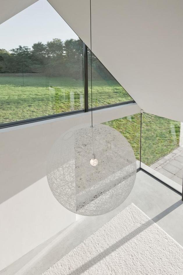 modern-barn-style-home-showcases-glazings-below-grade-ramp-7-light.jpg