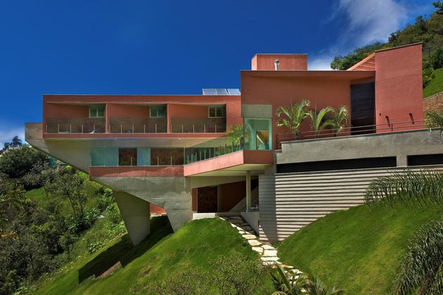 sculptural-concrete-house-built-on-a-steep-slope-14.jpg