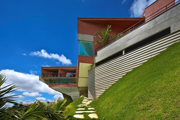 sculptural-concrete-house-built-on-a-steep-slope-8.jpg