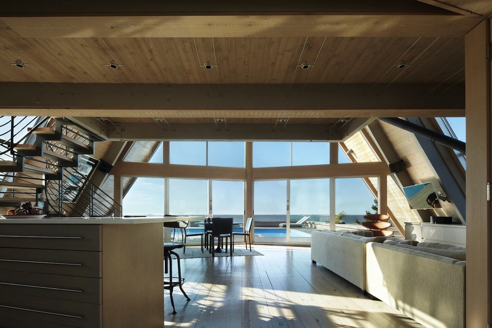 beachfront-a-frame-with-wide-open-interior-15-kitchen-living-room.jpg
