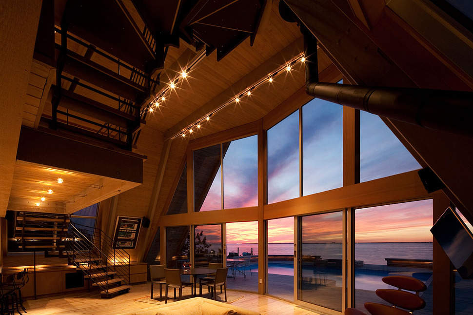 beachfront-a-frame-with-wide-open-interior-21-main-room-night.jpg