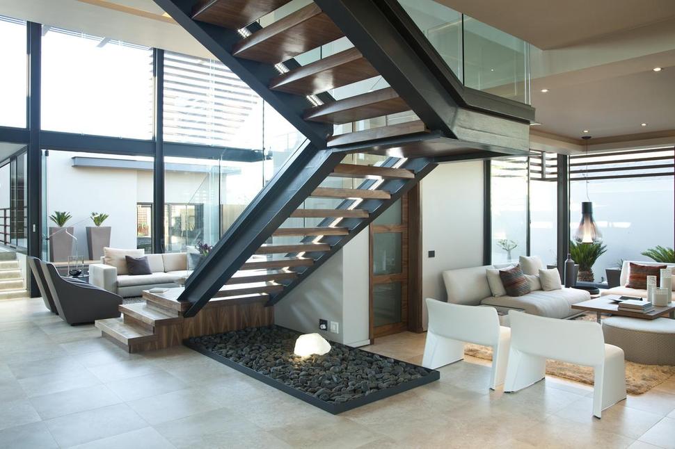 glass-steel-renovation-with-bedroom-bridge-14-living-space.jpg