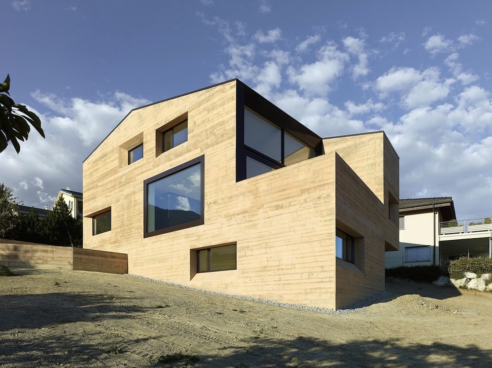 hillside-house-with-wood-look-concrete-covering-8-day-rear-left.jpg