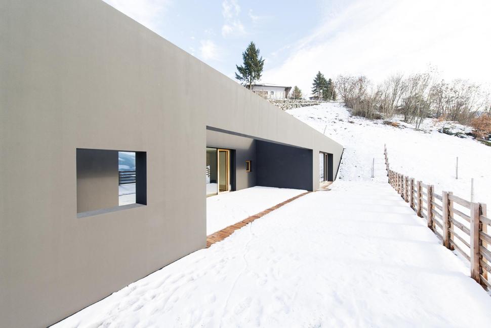 home-built-into-vineyard-slope-natural-stone-walls-8-terrace.jpg