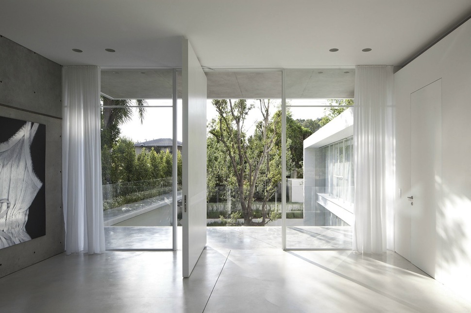 minimal-house-with-hangar-style-rear-facade-26-looking-out.jpg