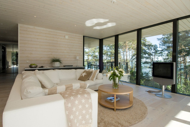 modern-wooden-vacation-house-built-on-rocks-8-living-room.jpg