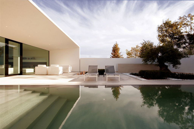 serene-white-house-with-walled-outdoor-space-5-pool-toward-patio.jpg