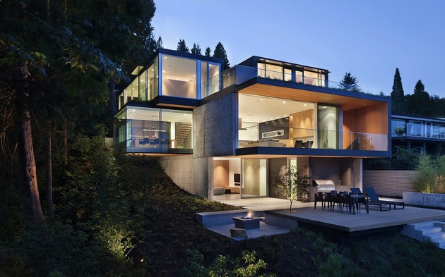 sleek-slope-house-with-interior-featuring-concrete-1-rear-evening.jpg