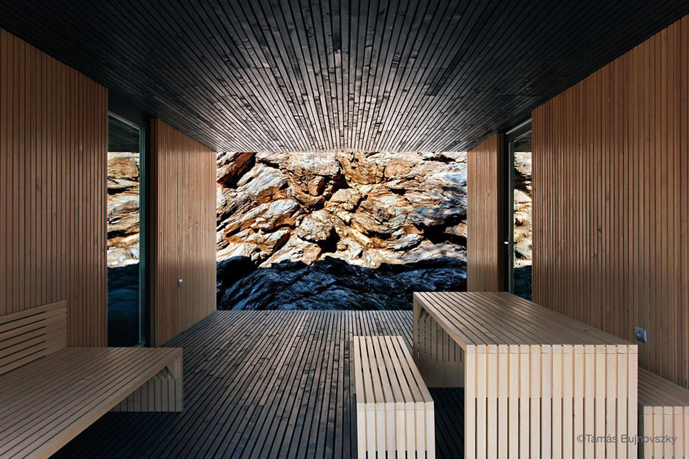 timber-cabin-built-into-cliff-side-site-6.jpg