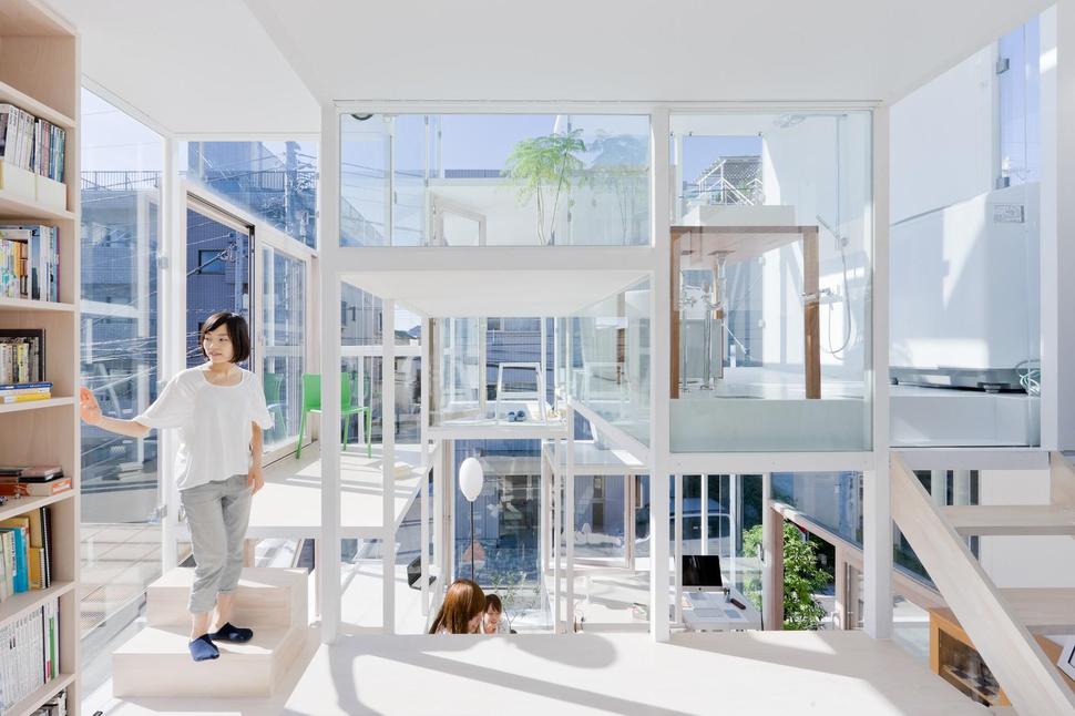 urban-glass-walled-house-with-platform-living-spaces-4-interior-platforms.jpg