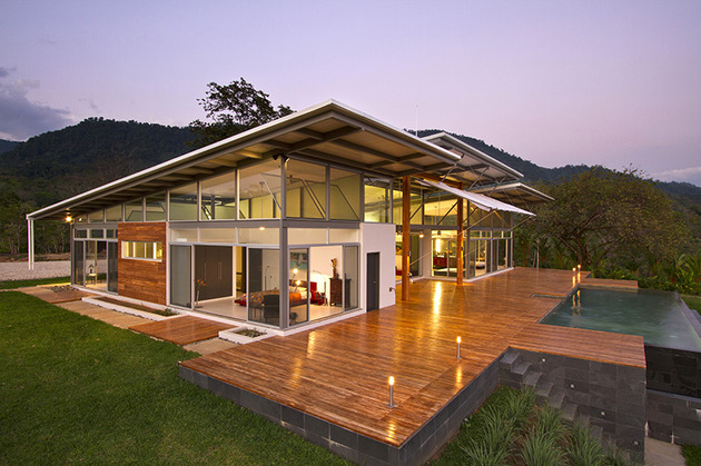 2-adjustable-eaves-create-thermal-comfort-glass-house-1-exterior.jpg
