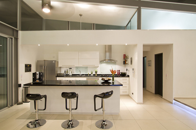 2-adjustable-eaves-create-thermal-comfort-glass-house-8-kitchen.jpg