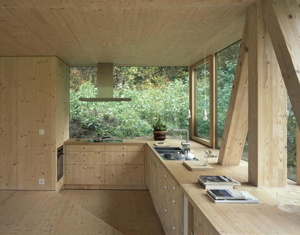 barn-home-floats-round-window-over-lower-facade-glass-15-kitchen.jpg