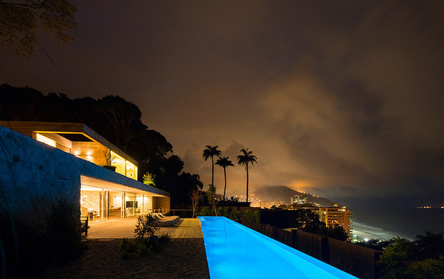 contemporary-hillside-luxury-house-made-from-stone-5-decks-night.jpg