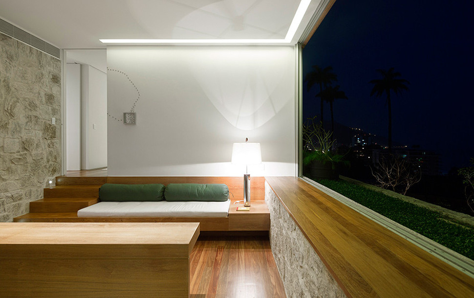 contemporary-hillside-luxury-house-made-from-stone-9-sunken-living-room.jpg