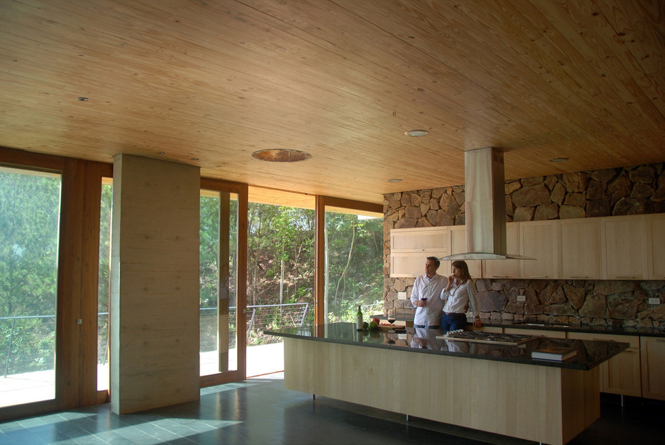 grass-roofed-home-built-slope-hillside-cooling-16-kitchen.jpg