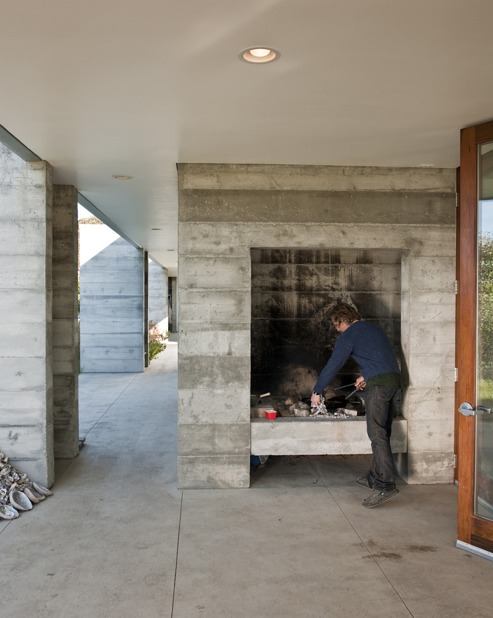 prefab-concrete-farmhouse-cypress-slab-table-salvaged-branch-crystal-chandelier-10-deck.jpg