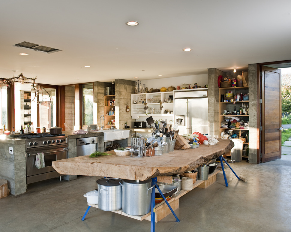 prefab-concrete-farmhouse-cypress-slab-table-salvaged-branch-crystal-chandelier-23-kitchen.jpg