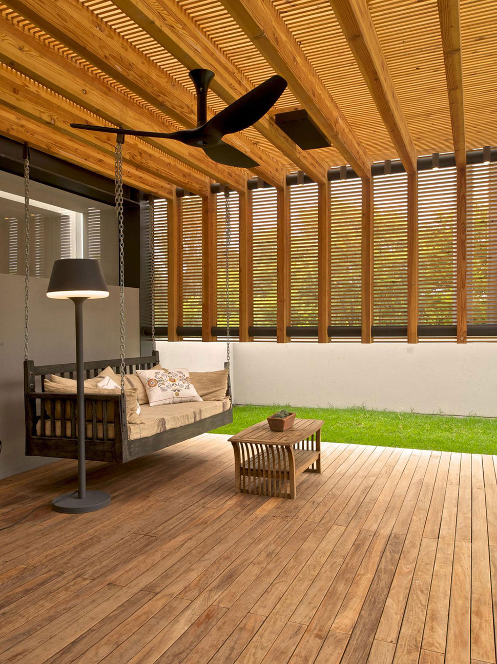 indoor-outdoor-zones-accentuated-vertical-gardens-17-porch-swing.jpg
