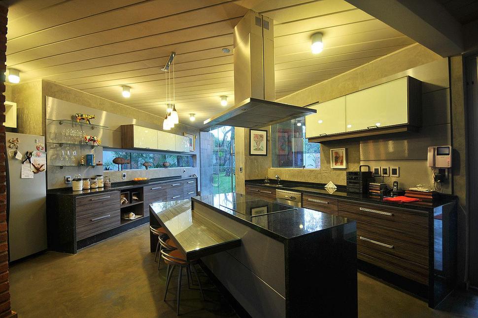 tree-pierces-roof-other-details-brick-home-19-kitchen.jpg