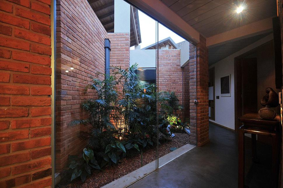 tree-pierces-roof-other-details-brick-home-36-courtyard.jpg