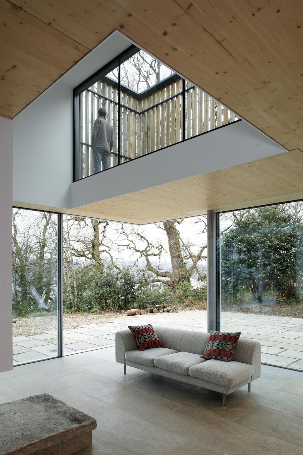 glass-living-edge-wood-clads-house-contrasts-31-terrace.jpg