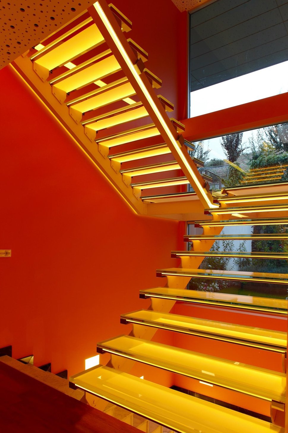 ultramodern-house-with-vibrant-lighting-design-focus-11-stairs-orange.jpg
