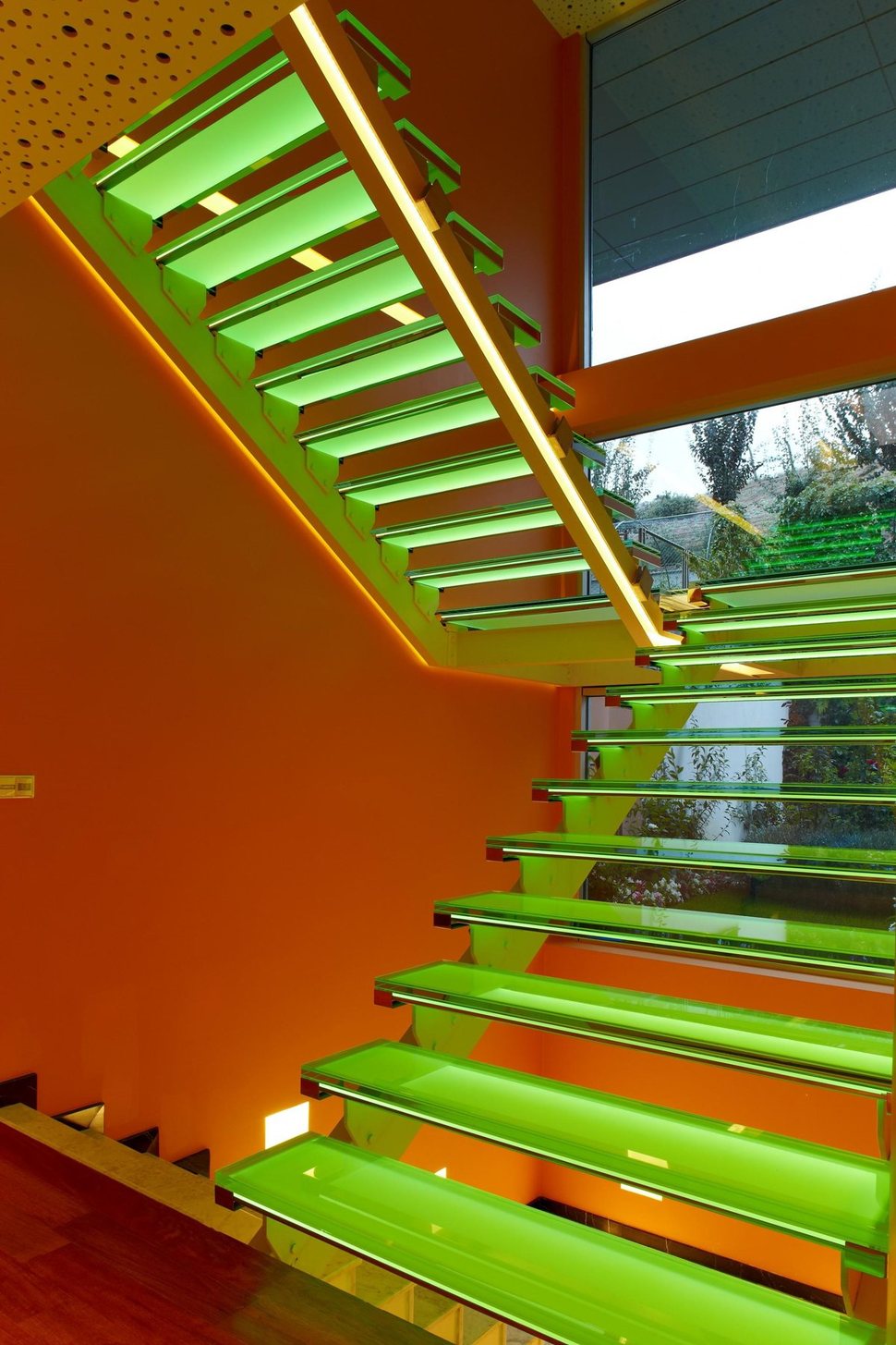 ultramodern-house-with-vibrant-lighting-design-focus-12-stairs-green.jpg