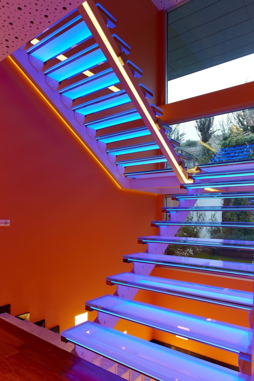 ultramodern-house-with-vibrant-lighting-design-focus-13-stairs-blue.jpg
