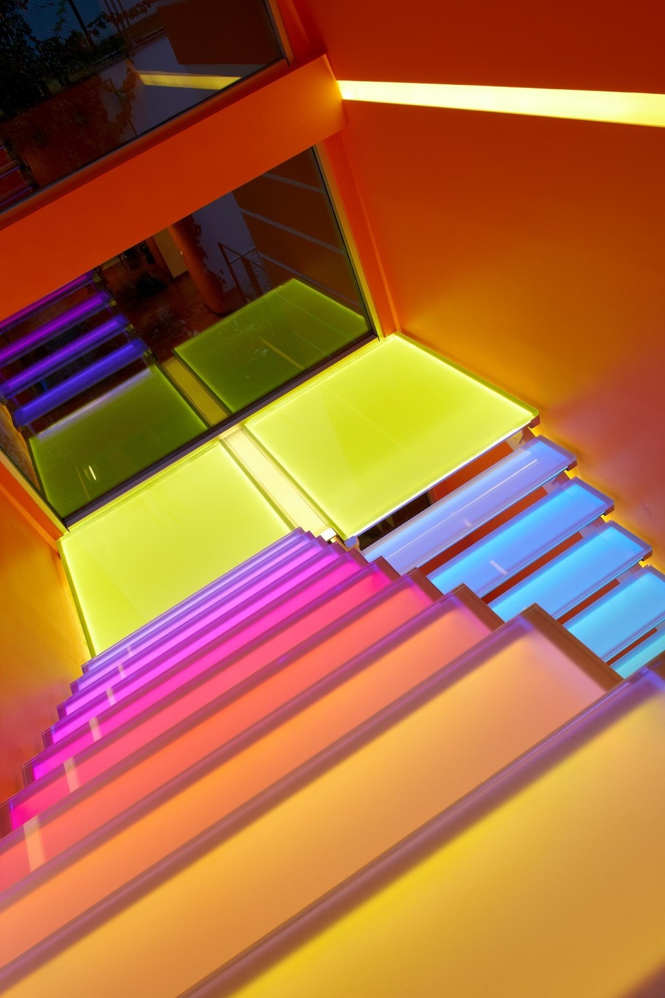ultramodern-house-with-vibrant-lighting-design-focus-15-stairs-ranbow-down.jpg
