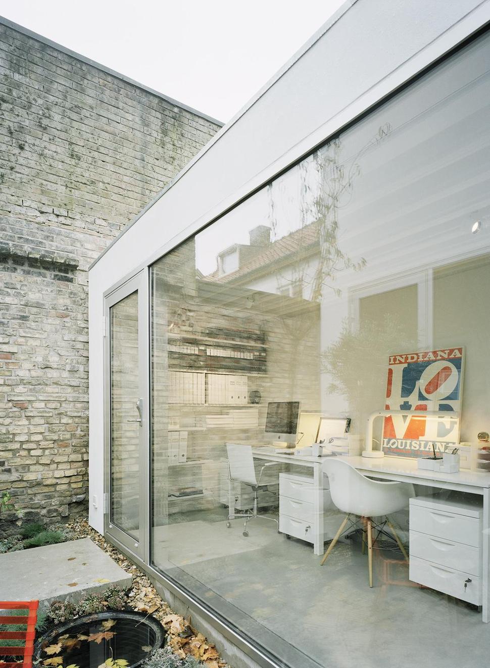 white-townhouse-with-open-interiors-detached-office-14-office-doors.jpg