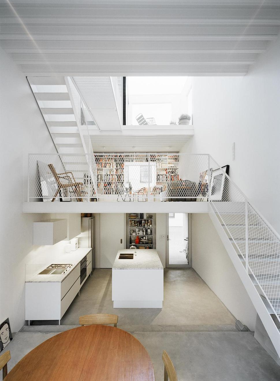 white-townhouse-with-open-interiors-detached-office-6-open-interior.jpg