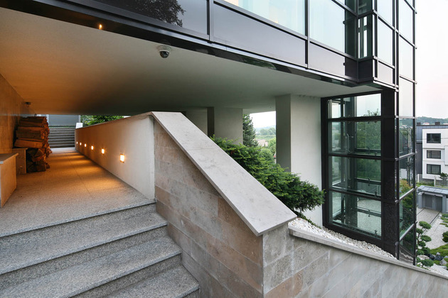 glass-elevator-multiple-levels-slope-house-27-outdoor-stairs.jpg