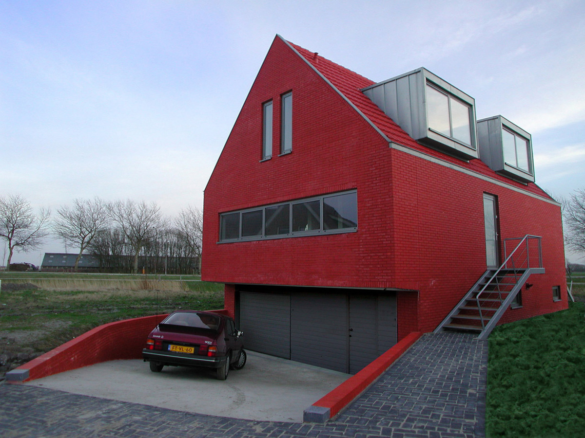 red-house-exteriors-paint-the-town-dutch-home.jpg