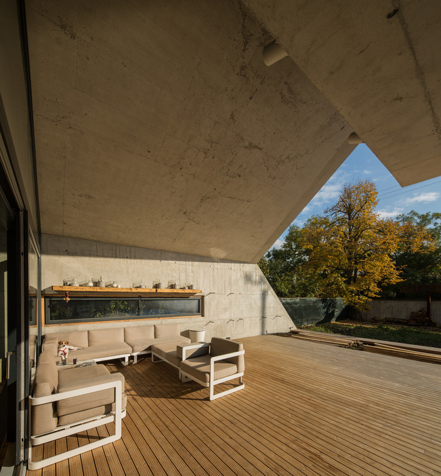 6-asymmetrical-concrete-addition-modernises-existing-home.jpg