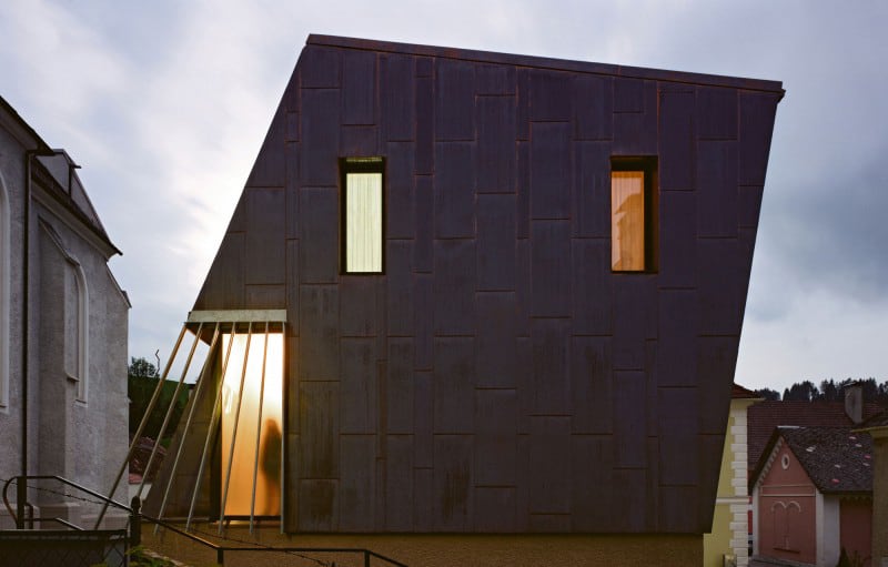 austrian house with copper exterior and slanted shape 13
