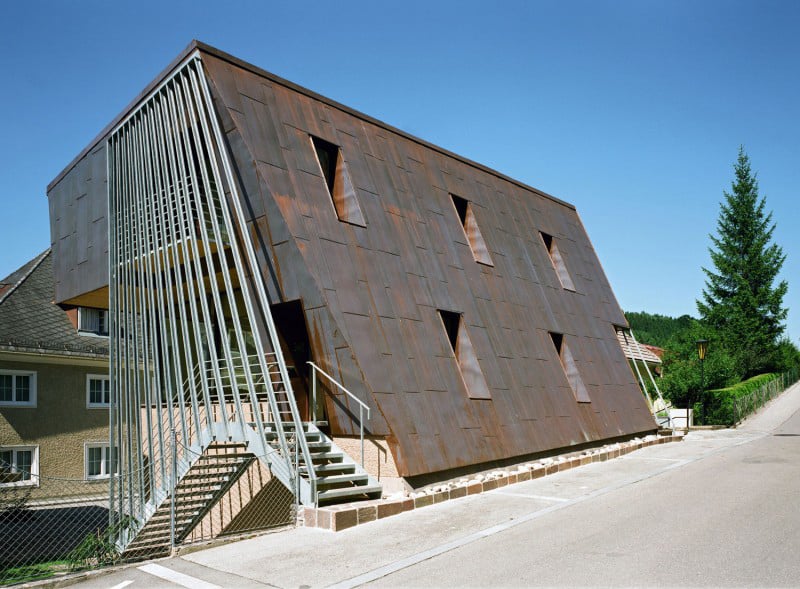 austrian house with copper exterior and slanted shape 4