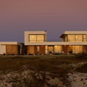Beach House With Reconfigurable Wood Panels