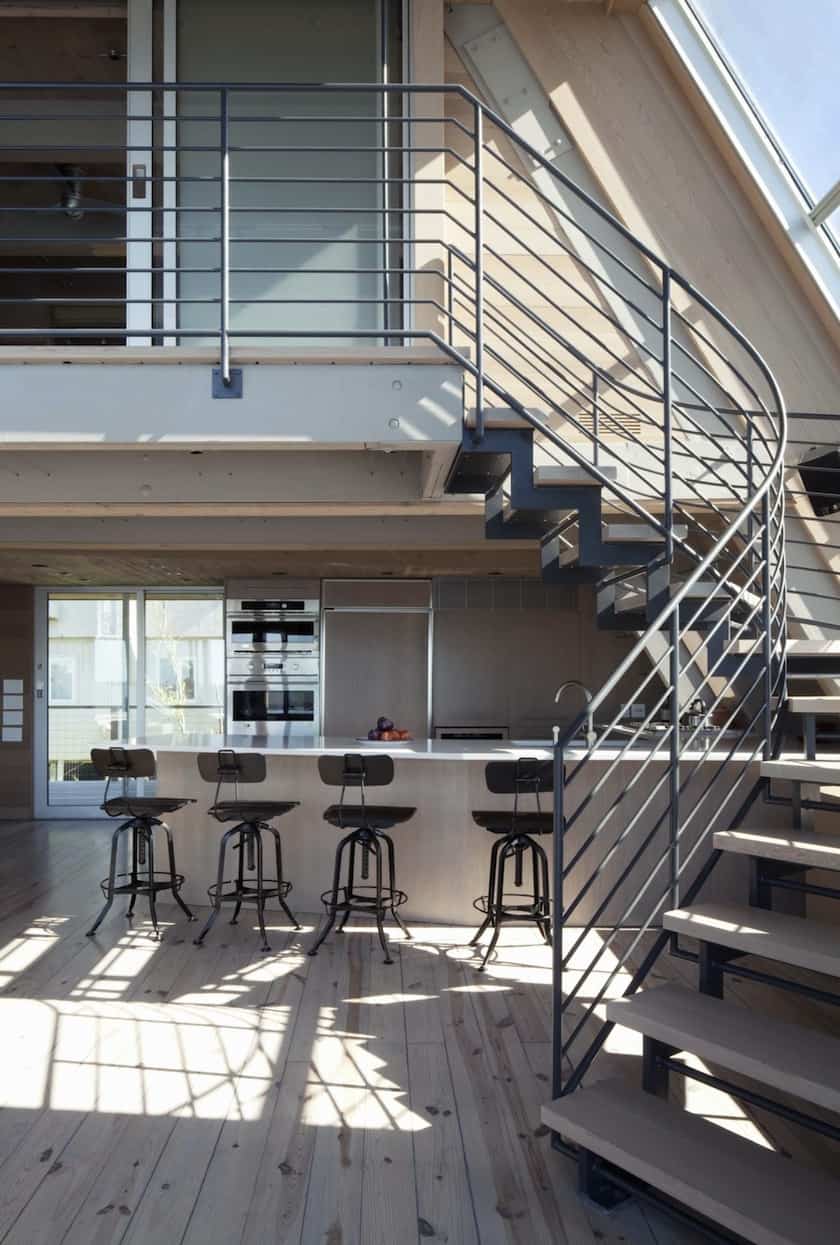 beachfront-a-frame-with-wide-open-interior-17-kitchen-stairs.jpg