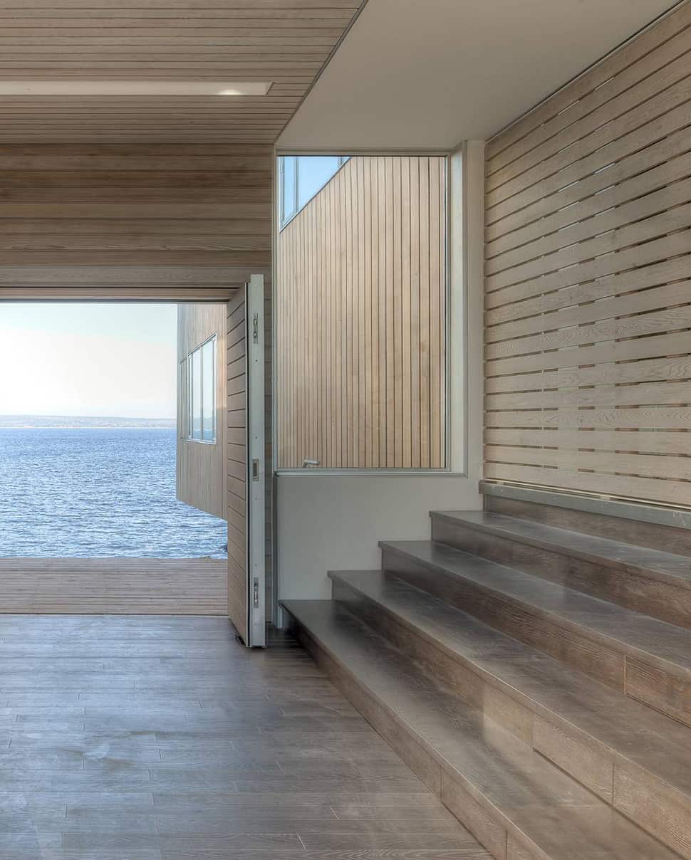 boat-inspired-wood-house-hanging-over-the-ocean-11.jpg