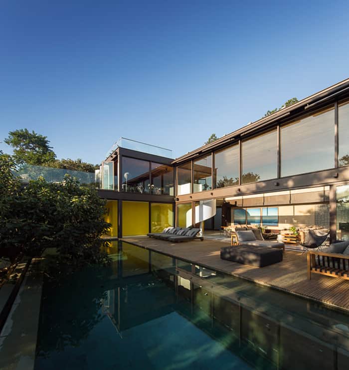 brazil house brings indoors out with glass wall design 4