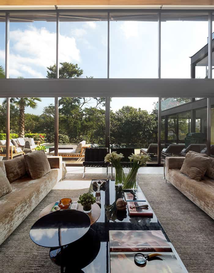 brazil house brings indoors out with glass wall design 7