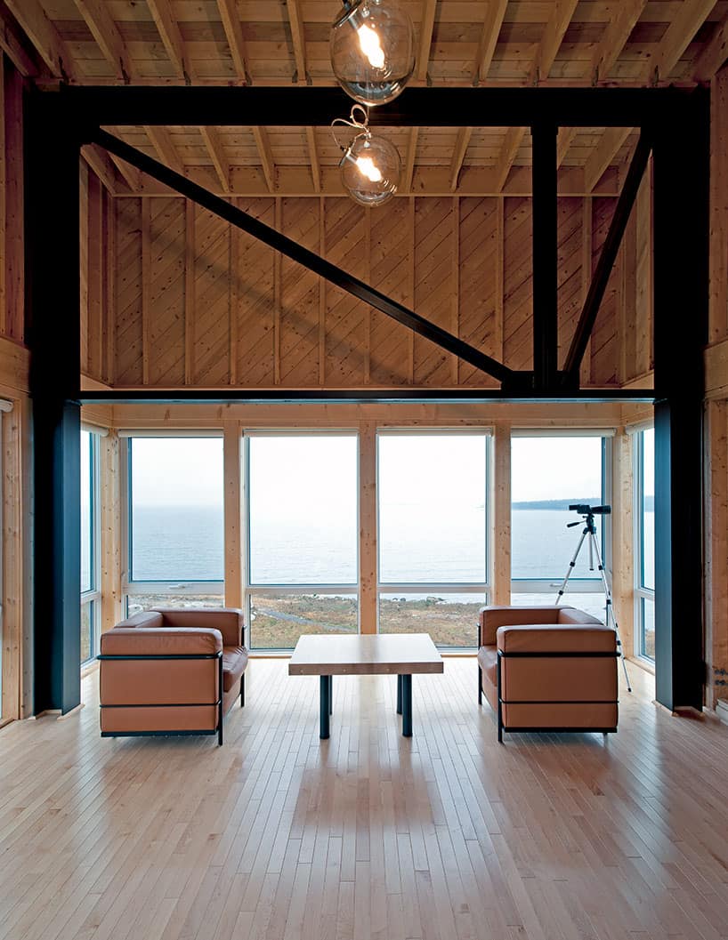 cantilevered-cliff-house-with-timber-finishes-10-sitting-room.jpg