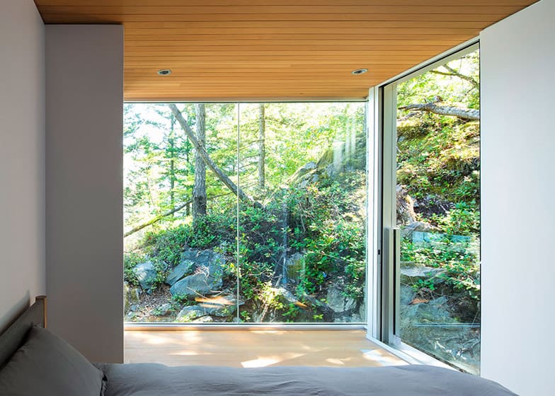 cantilevered contemporary escape in canadian wilderness 11 second bedroom
