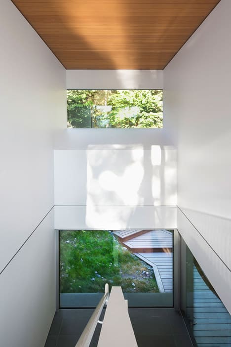 cantilevered contemporary escape in canadian wilderness 8 entry stairs
