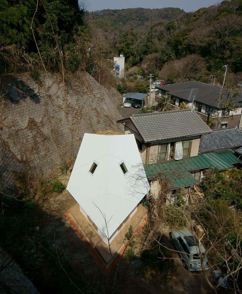 compact diamond shaped house plan yuji tanabe 3 above narrow view